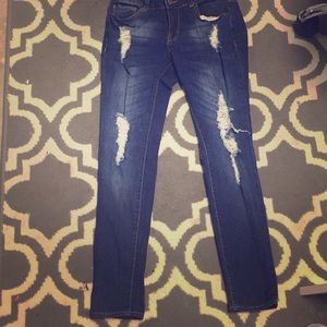 dark blue ripped jeans